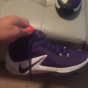 Women’s purple Nike basketball shoes